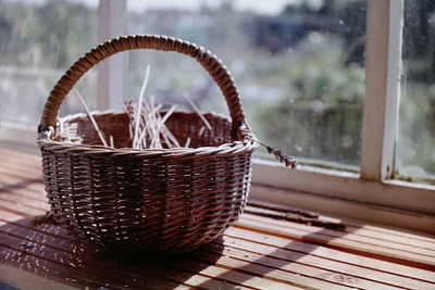 Close-up of wicker basket on table