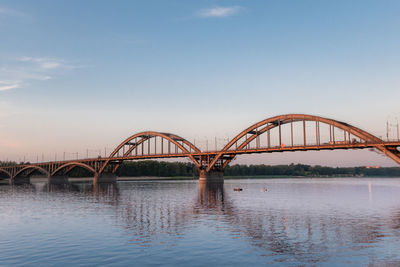 Bridge over river against sky