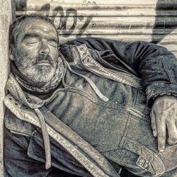 Close-up of man wearing shoes