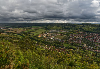 High angle view of agricultural landscape against sky