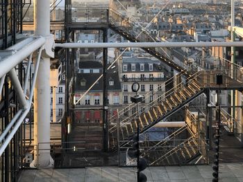 High angle view of steps by buildings in city
pompidou museum