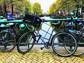 Bicycle parked by tree
