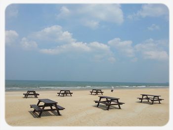 Scenic view of beach against sky