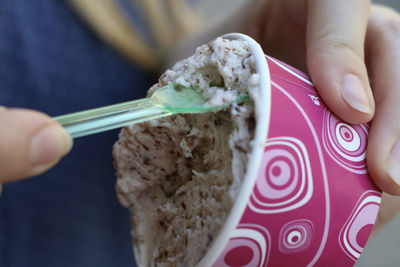 Close-up of woman holding ice cream