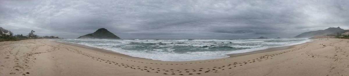 Panoramic view of beach against sky