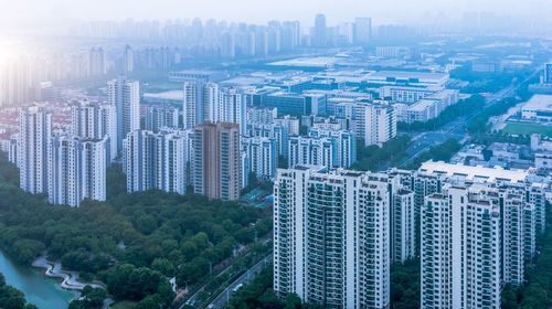 High angle view of modern buildings in city