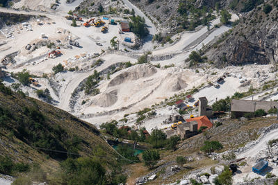 View of the carrara marble quarries with excavation equipment ready for work.