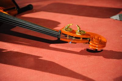 High angle view of violin on floor