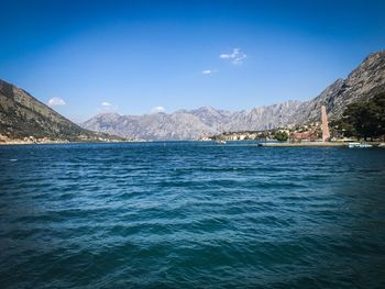 Scenic view of sea against blue sky