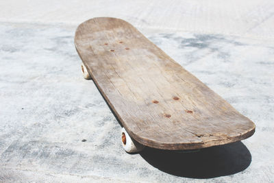 Wooden skateboard on street