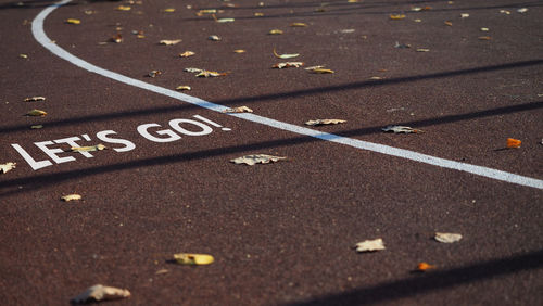 High angle view of text on road