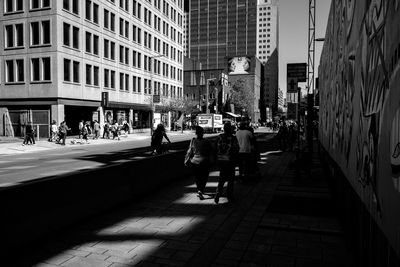 People sitting in city