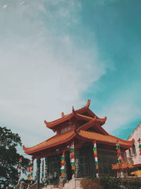 Low angle view of temple building against sky