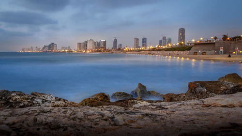 View of cityscape with sea in background