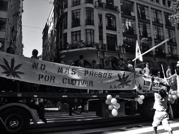 Man looking at city street