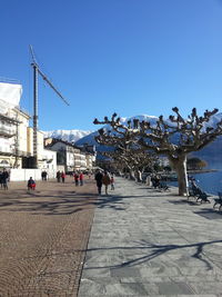 View of buildings against clear blue sky