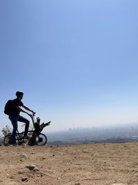 Man riding motorcycle on land