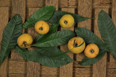 Directly above shot of fruits in basket on table