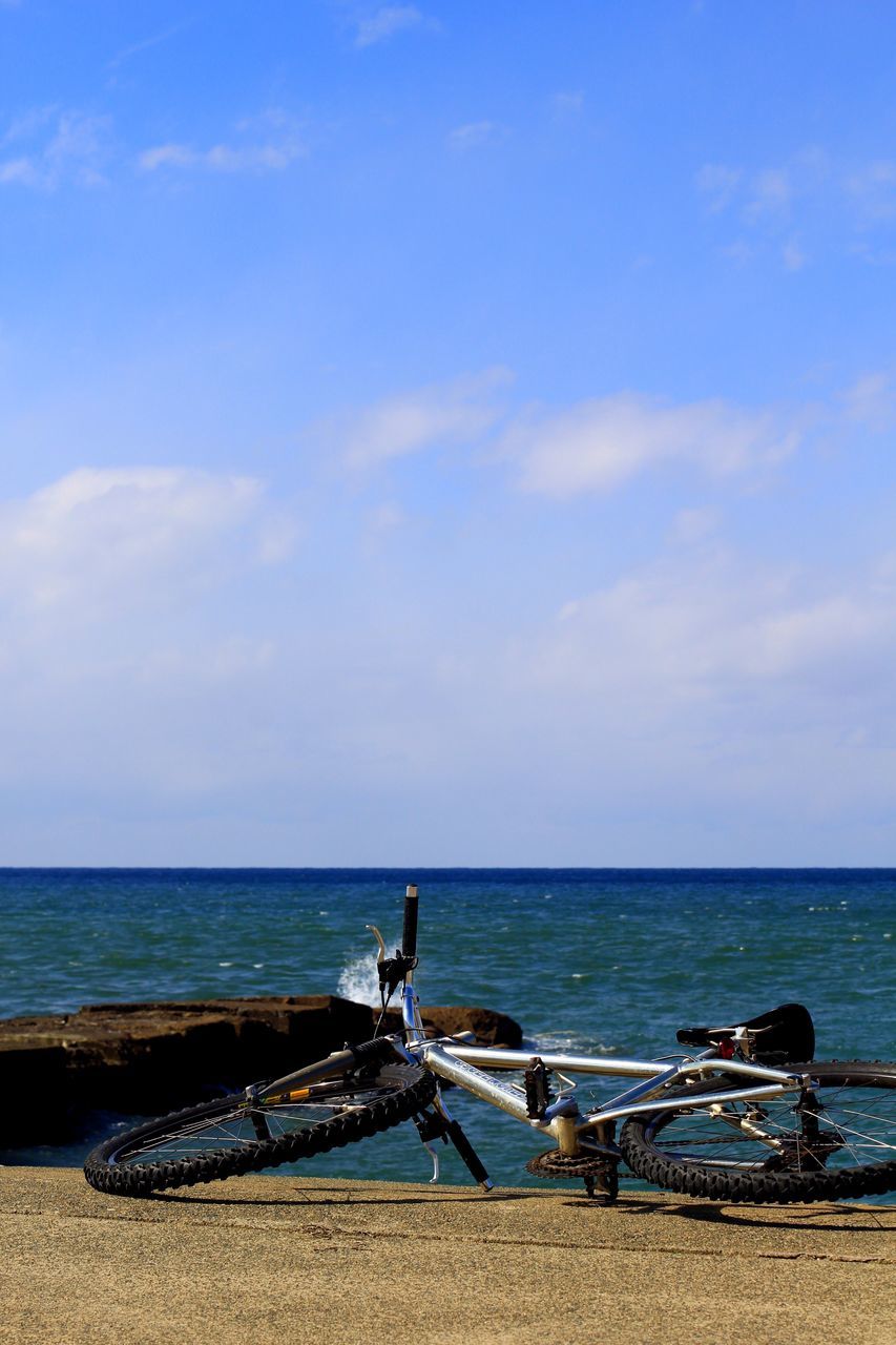 sea, horizon over water, water, sky, blue, beach, tranquility, tranquil scene, scenics, shore, nature, beauty in nature, cloud - sky, cloud, day, outdoors, sunlight, no people, nautical vessel, idyllic