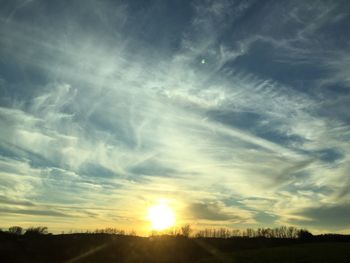 Scenic view of landscape at sunset