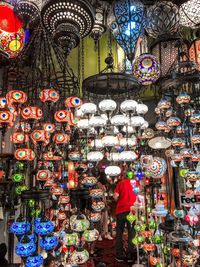 Rear view of people at market stall