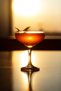 Close-up of wineglass on table