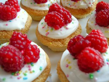 Close-up of raspberries on cupcakes