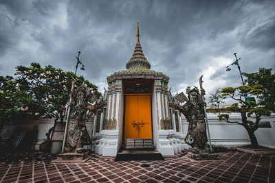 Low angle view of statue against sky