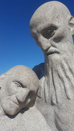 Close-up of statue against sky