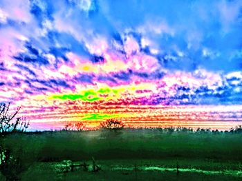 Scenic view of dramatic sky over lake