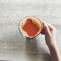 Directly above shot of coffee cup on table