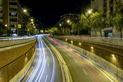 Time lapse lights and streets in the city of barcelona at night