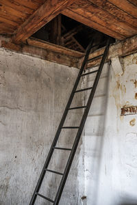 Low angle view of staircase in abandoned building