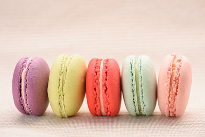 Close-up of multi colored candies on table