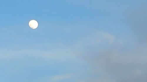 Low angle view of moon in sky