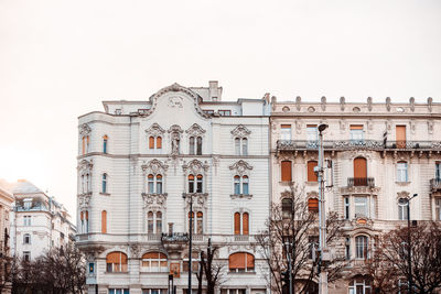 Low angle view of buildings against clear sky