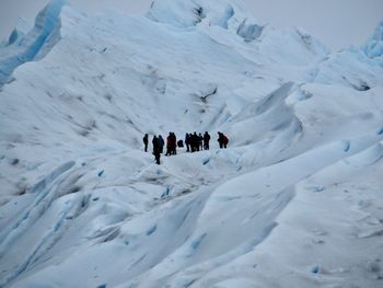 People on snow covered mountain