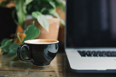 Coffee cup on table