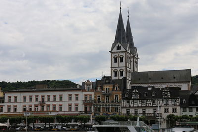 View of buildings in city against sky