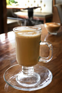 Close-up of coffee served on table