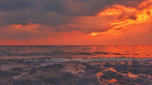 Scenic view of sea against sky during sunset