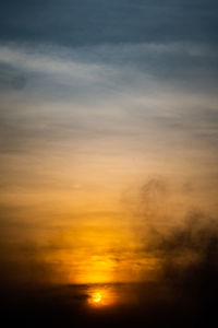 Scenic view of dramatic sky during sunset