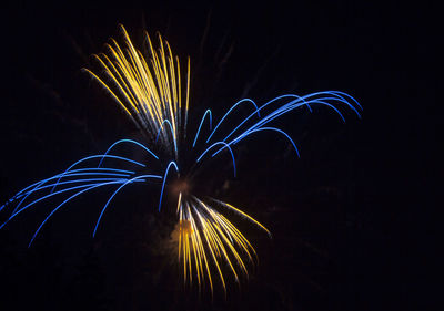 Firework display at night