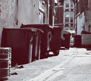 Street amidst buildings in city during winter