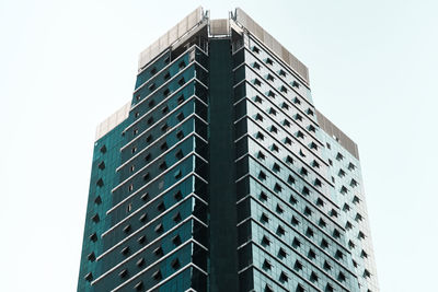 Low angle view of modern building against clear sky