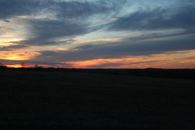 Scenic view of landscape at sunset