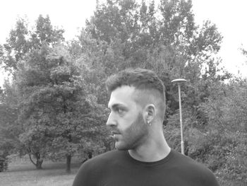 Portrait of young man looking away