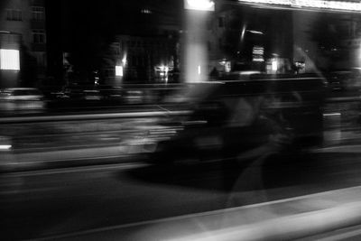 Blurred motion of cars on road at night