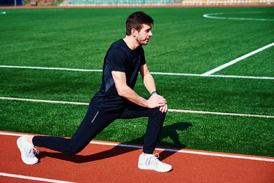 Sport man preparing for jogging outdoors