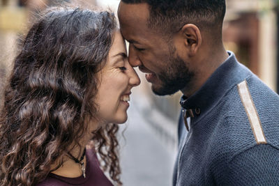 Side view of couple kissing